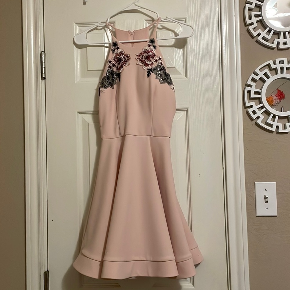 A light pink dress. Could wear to high school homecoming